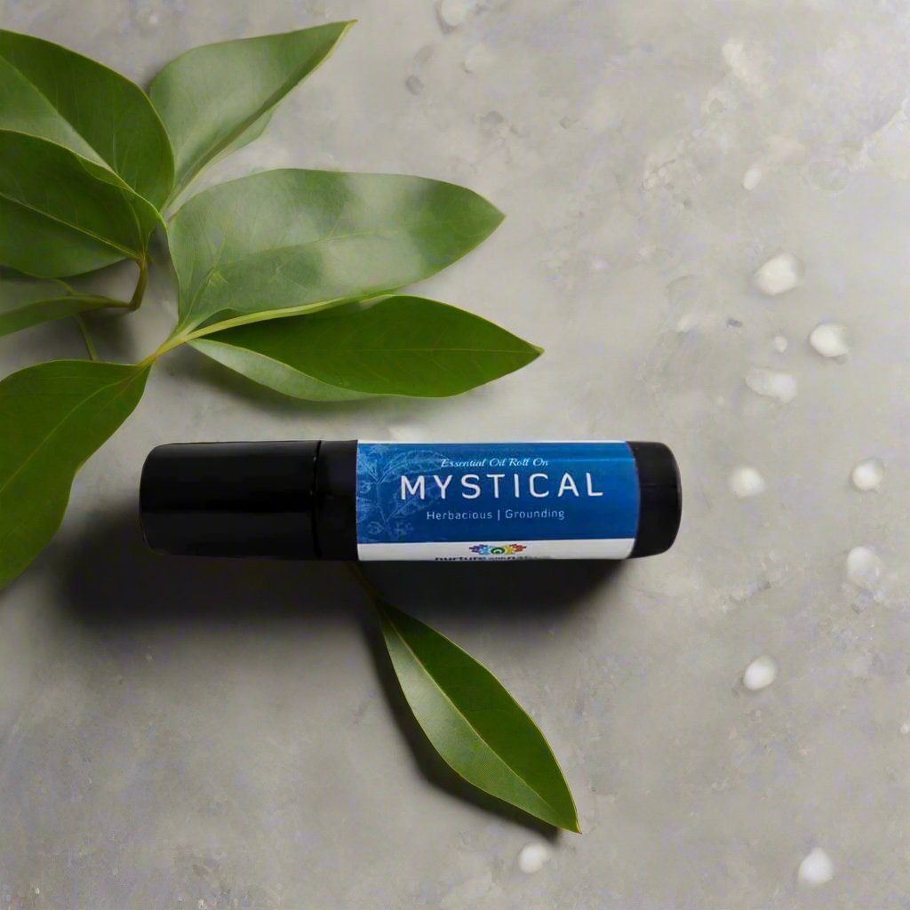 Mystical Roll On with Tea Tree: A convenient and soothing essential oil blend in a roll-on applicator, perfect for on-the-go use to promote a sense of calm and well-being.