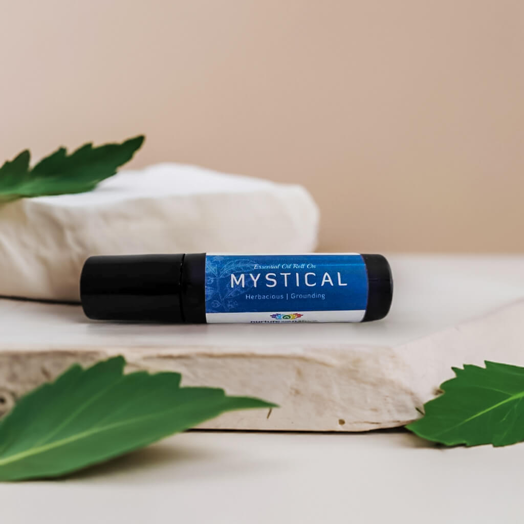 Mystical Roll On with Tea Tree: A convenient and soothing essential oil blend in a roll-on applicator, perfect for on-the-go use to promote a sense of calm and well-being.