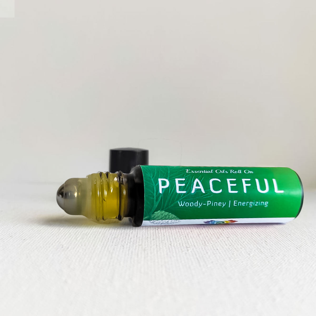 Energizing essential oil roll on  peaceful